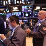 Wall Street closed lower on Thursday, as growing fears of an artificial intelligence (AI) bubble combined with persistent inflation concerns pushed investors to reduce risk exposure.